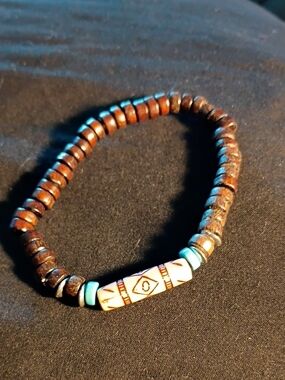 Beaded Wooden Bracelet with Turquoise Accent and Patterned Center Bead